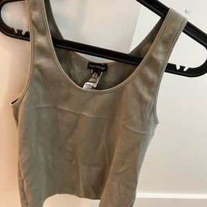Sage green ripped tank top from urban planet. Size: L.